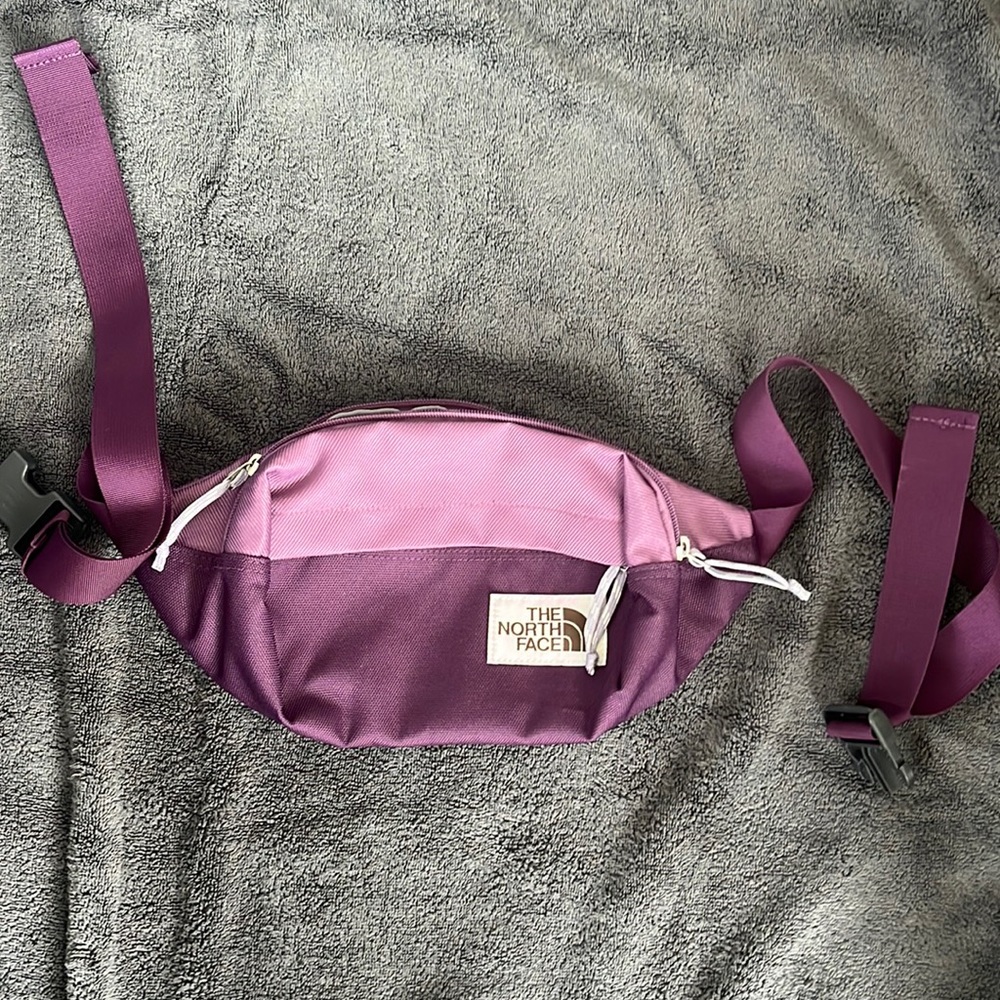 purple, 2 zip pockets and buckle